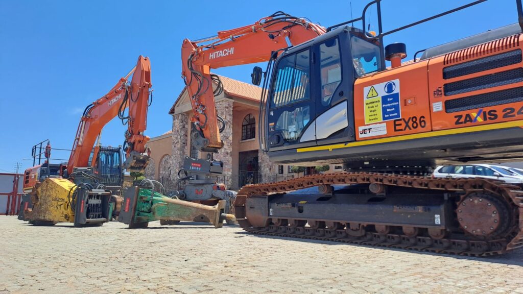 A Hitachi 240-5G demolition excavator with the OilQuick system