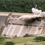 Controlled explosive blasting of the deck spillway and piers