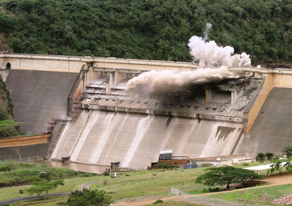 Controlled explosive blasting of the deck spillway and piers