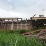 Mechanical demolition of the bridge section over the spillway