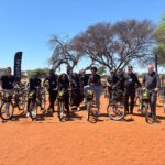 Zutari and Qhubeka teams pictured with the donated bicycles