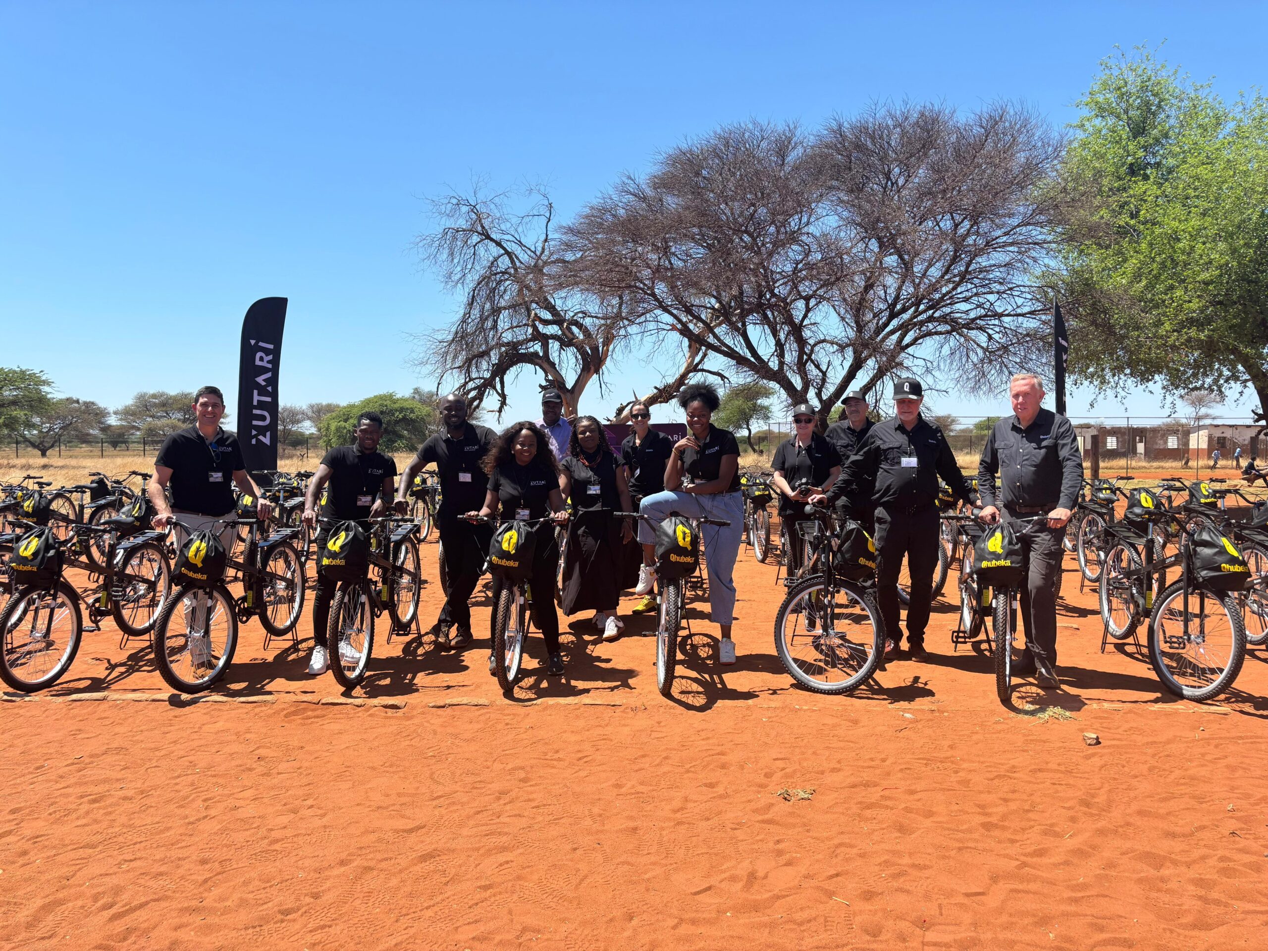 Zutari and Qhubeka teams pictured with the donated bicycles