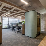 Open-plan-workstations-and-acoustic-pods-support-both-focused-work-and-collaboration