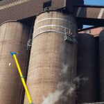 Material build-up inside a silo can progressively reduce effective capacity, restrict material flow and contribute to operational bottlenecks.