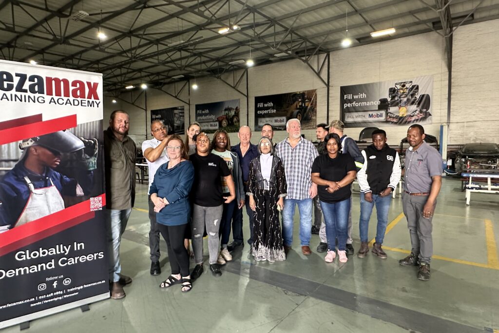 Representatives from Fezamax Training Academy and Mobil™ come together to support skills development and artisan training in South Africa.