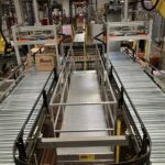 Uteco Bauli plant, Feed lines delivering cases to the palletising robots