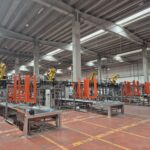 Uteco Bauli plant, Feed lines delivering empty pallets to the four palletising stations