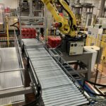 Uteco Bauli plant, Feed lines delivering visual boxes to the palletising robots